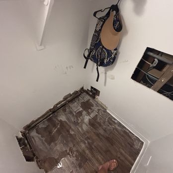Kapilina Beach Homes - Damaged wall from the leak, and hole to find said leak - Apartments Near Me - Ewa Beach, Hawaii