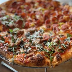 Another angle of my custom half and half pizza pie. More please.