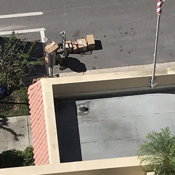 Colonial Van Lines - This is how they handled the breakables knocked them over and broke everything inside and let in lay in the road! - Movers Near Me - Pompano Beach, Florida