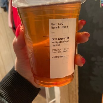Starbucks - a person holding a cup of tea - Coffee & Tea Near Me - Wasco, California