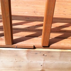 All Pro Landscaping Construction - Piece of decking added to the front end of the deck to make up for measuring mistake.