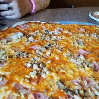 Manny's Pizza - Who uses American(?) cheese on a pizza without warning the customer? This was inedible. We left it on the table just like this after a bite. - Pizza Near Me - Savanna, Illinois Manny's Pizza - Who uses American(?) cheese on a pizza without warning the customer? This was inedible. We left it on the table just like this after a bite. - Pizza Near Me - Savanna, Illinois