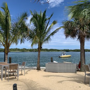 Blue Pointe Bar and Grill - Outside tiki area - Bars Near Me - Tequesta, Florida Blue Pointe Bar and Grill - Outside tiki area - Bars Near Me - Tequesta, Florida