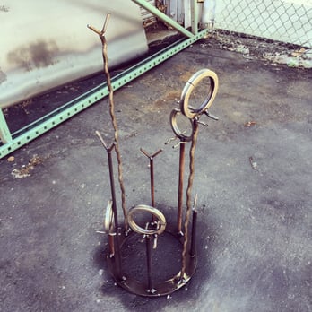 Rossi Sculptural Designs - Built a wine rack - Metal Fabricators Near Me - Sacramento, California Rossi Sculptural Designs - Built a wine rack - Metal Fabricators Near Me - Sacramento, California