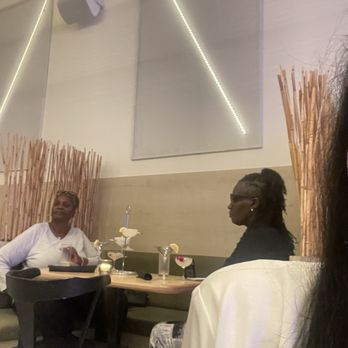 Nafsi - The 2 ladies who were seated in a booth for 4 as we were told. - New American Near Me - Chicago, Illinois Nafsi - The 2 ladies who were seated in a booth for 4 as we were told. - New American Near Me - Chicago, Illinois