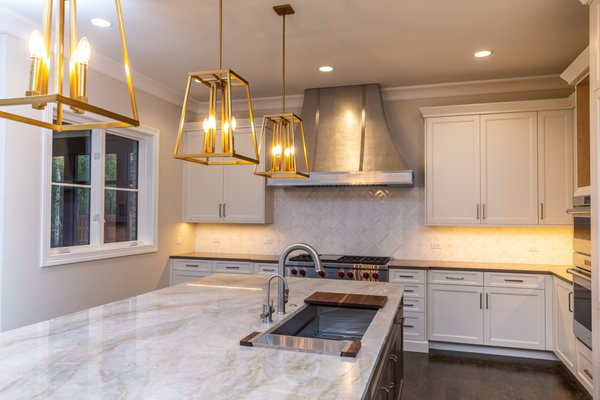 Kitchen Vanities & Fixtures - Plumbers by trade, kitchen remodelers by passion. Proudly serving homeowners across Northern Chicago since 1991. From farmhouse sinks with gold bridge faucets to professional gas ranges with pot fillers, we install and replace kitchen fixtures that blend luxury with function. Contact us today for a free estimate. Kitchen Vanities & Fixtures - Plumbers by trade, kitchen remodelers by passion. Proudly serving homeowners across Northern Chicago since 1991. From farmhouse sinks with gold bridge faucets to professional gas ranges with pot fillers, we install and replace kitchen fixtures that blend luxury with function. Contact us today for a free estimate.