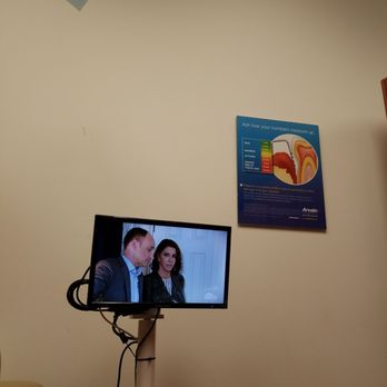 DentalWorks Fairlawn - Tv at the end of the chair in room - Periodontists Near Me - Fairlawn, Ohio DentalWorks Fairlawn - Tv at the end of the chair in room - Periodontists Near Me - Fairlawn, Ohio