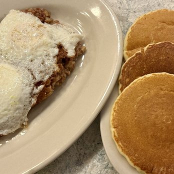 Jahns Since 1897 - Corned Beef Hash and Eggs with side of Pancakes - Diners Near Me - Jackson Heights, New York