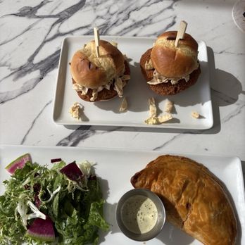 The MODERN Kitchen and Bar - Meat pie with lime cilantro cream and crabcake sliders - Cocktail Bars Near Me - Long Beach, California The MODERN Kitchen and Bar - Meat pie with lime cilantro cream and crabcake sliders - Cocktail Bars Near Me - Long Beach, California