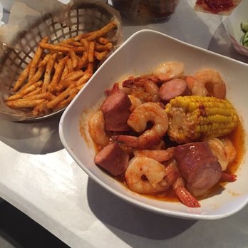 The Crab Shack - Free cajun fries with check in and spicy peeled shrimp with sausage and corn - Cajun/Creole Near Me - Gardena, California The Crab Shack - Free cajun fries with check in and spicy peeled shrimp with sausage and corn - Cajun/Creole Near Me - Gardena, California