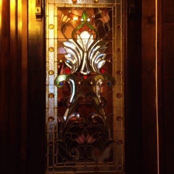 Belvoir Winery - Beautiful glass designs on the tasting room windows. - Venues & Event Spaces Near Me - Liberty, Missouri