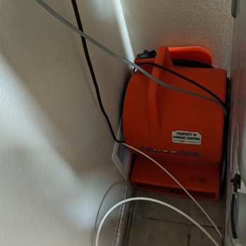 Damage Control 911 - Forced air fan to dry out underneath drywall - Damage Restoration Near Me - Orlando, Florida
