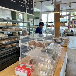 Great Harvest Bread - Herndon - Front ordering counter with fresh baked bread selections on open racks - THAT fresh. The place smells amazing, the staff is so nice