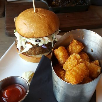 Carson Kitchen - Jerk Turkey Burger with slaw! This was a very flavorful burger, I would most definitely order this again - New American Near Me - Las Vegas, Nevada