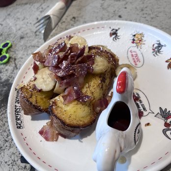Breakfast Republic - Mr Presley - French toast with peanut butter in the middle and bananas and bacon on top - Breakfast & Brunch Near Me - San Diego, California Breakfast Republic - Mr Presley - French toast with peanut butter in the middle and bananas and bacon on top - Breakfast & Brunch Near Me - San Diego, California