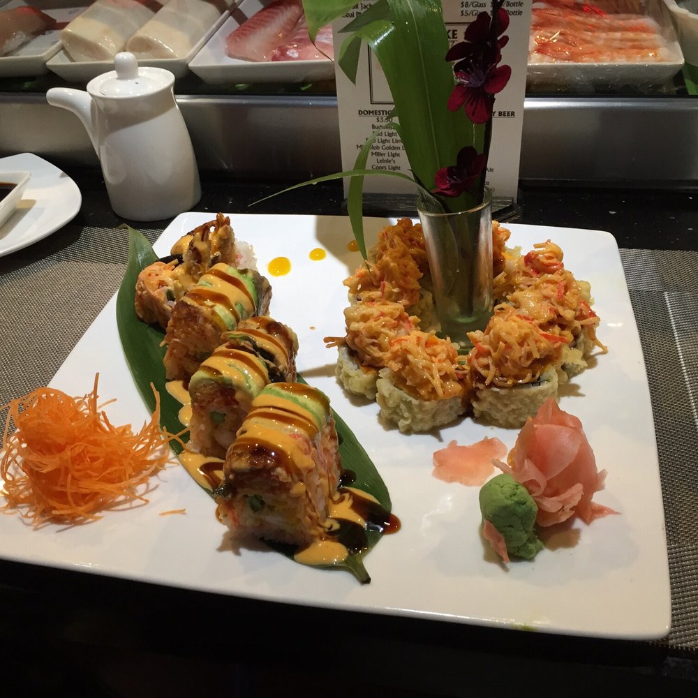 Sakura Japanese Restaurant - Paradise on the left and Volcano roll on the right. - Japanese Near Me - Chippewa Falls, Wisconsin Sakura Japanese Restaurant - Paradise on the left and Volcano roll on the right. - Japanese Near Me - Chippewa Falls, Wisconsin
