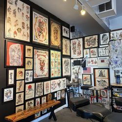 InBloom Tattoo and Piercing  - Corner that has some tattoo designs!