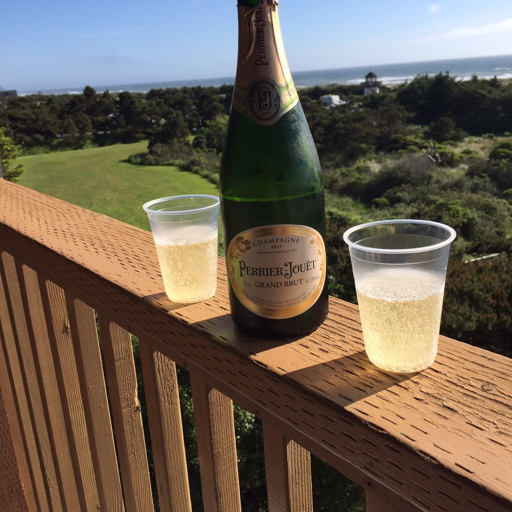 Ireland's Rustic Lodges - Our balcony. It was our anniversary and some friends had this champagne waiting for us! - Hotels Near Me - Gold Beach, Oregon Ireland's Rustic Lodges - Our balcony. It was our anniversary and some friends had this champagne waiting for us! - Hotels Near Me - Gold Beach, Oregon