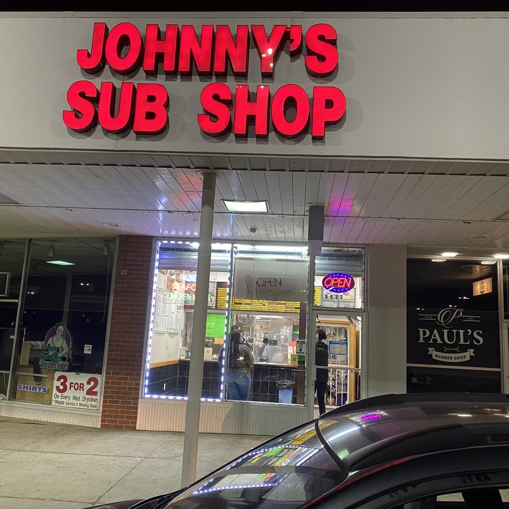 a car parked in front of the store