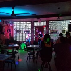 Traditions Pub - Many solo, duets, and full bands come here to play, this is Tom and Jo.