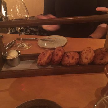 Roost - These are some complementary cheddar biscuits. Did I say that they were homemade? - New American Near Me - Greenville, South Carolina