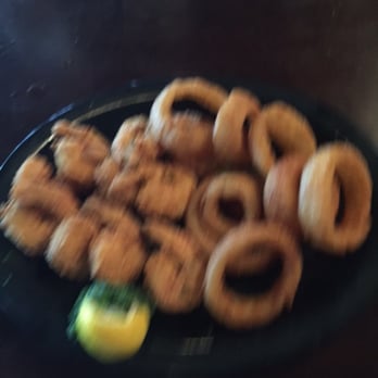 Riptides Raw Bar & Grill - Batter fried shrip with onion rings, sorry for the blurr - Seafood Near Me - Ormond Beach, Florida Riptides Raw Bar & Grill - Batter fried shrip with onion rings, sorry for the blurr - Seafood Near Me - Ormond Beach, Florida