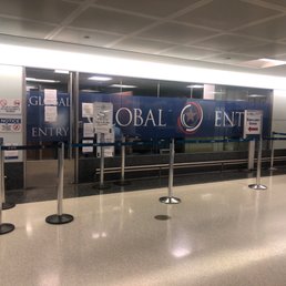 Enrollment center next to Terminal B baggage claim 1. No need to check in, just sit and wait for an officer to come out.