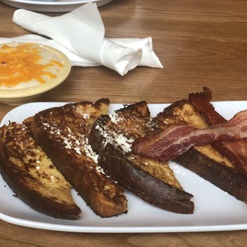 Ruby Sunshine Franklin - French toast with bacon and a side of cheese grits - Breakfast & Brunch Near Me - Franklin, Tennessee