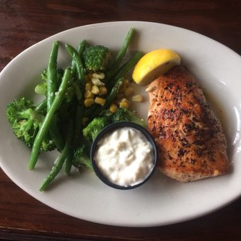 Crews Inn - The pan seared salmon has a lightly crispy exterior: it seriously doesn't need the tartar sauce. - Bars Near Me - Harrison Township, Michigan Crews Inn - The pan seared salmon has a lightly crispy exterior: it seriously doesn't need the tartar sauce. - Bars Near Me - Harrison Township, Michigan