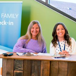 Forum Christian Church - Welcoming volunteers at our New Family check-in!