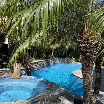 Gardner Outdoor and Pool Remodeling - After. Bella blue pebble sheen glastell-31 fujiwa tile - Pool & Hot Tub Service Near Me - Orange, California