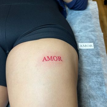 Ink Myth Tattoo - Red ink fine line "Amor" - Tattoo Near Me - Wildomar, California Ink Myth Tattoo - Red ink fine line "Amor" - Tattoo Near Me - Wildomar, California