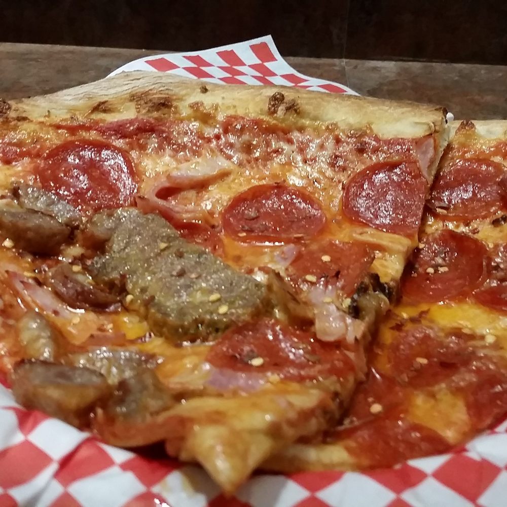Hidden Pizza - Meat Lovers slice and a Pepperoni slice - Pizza Near Me - Reno, Nevada Hidden Pizza - Meat Lovers slice and a Pepperoni slice - Pizza Near Me - Reno, Nevada
