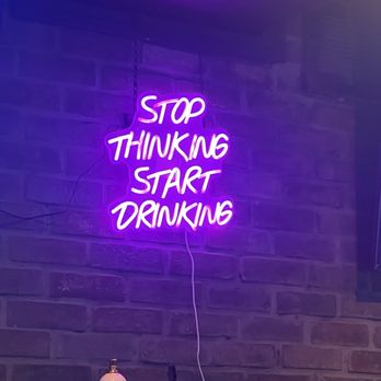 Arlington Tap House - Neon sign on the wall by the beer tappers.  I thought it was funny. - American Near Me - Arlington Heights, Illinois