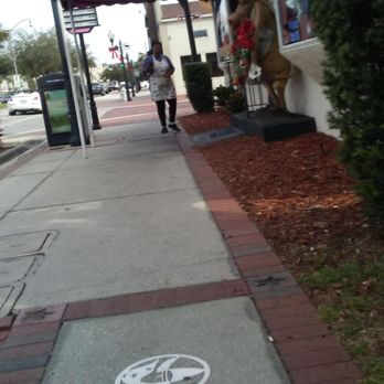 Historic Downtown - Sidewalk in front of taco place downtown Kissimmee. - Landmarks & Historical Buildings Near Me - Kissimmee, Florida Historic Downtown - Sidewalk in front of taco place downtown Kissimmee. - Landmarks & Historical Buildings Near Me - Kissimmee, Florida