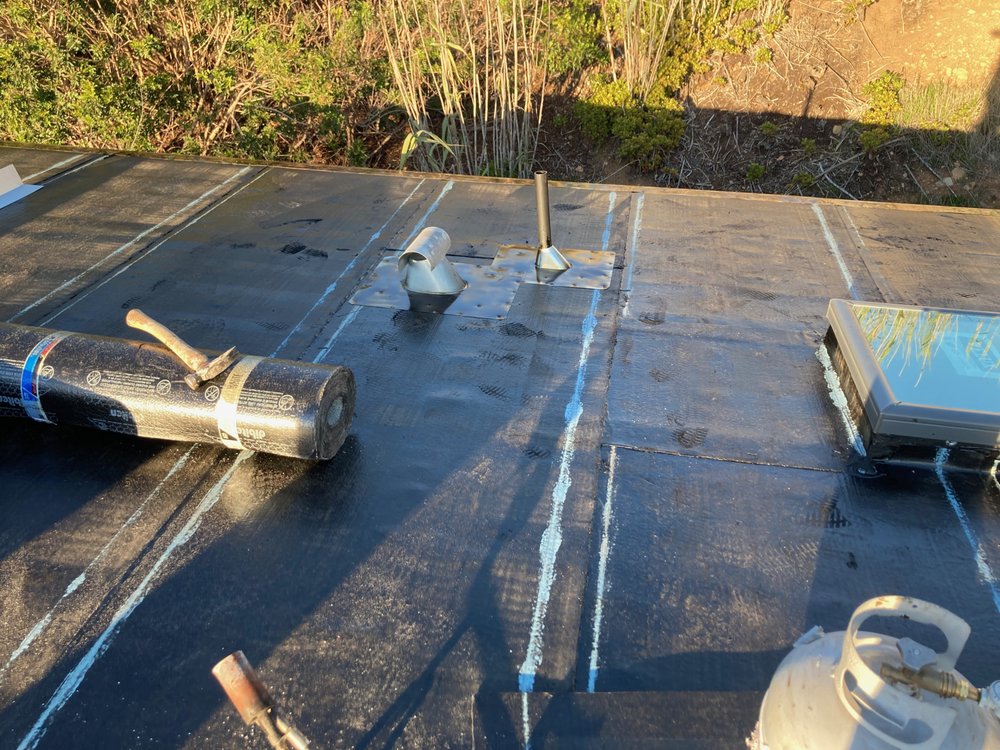 Slide of jauregui's roofing