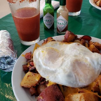 Mrs. Olson's Coffee Hut - Potato Deluxe plate. Red rose potatoes/bacon/ eggs over medium. A big portion, had to take some home. Enjoyed eating Brunch in the patio! - American Near Me - Oxnard, California Mrs. Olson's Coffee Hut - Potato Deluxe plate. Red rose potatoes/bacon/ eggs over medium. A big portion, had to take some home. Enjoyed eating Brunch in the patio! - American Near Me - Oxnard, California