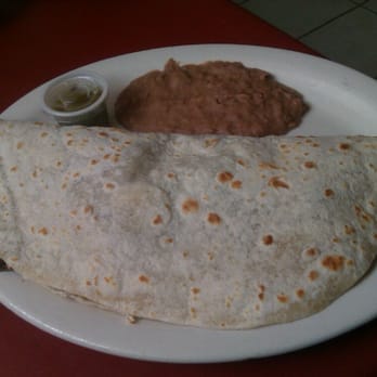 Tejano Grill - Fajita taco (LARGE) with refried beans. - Mexican Near Me - Harlingen, Texas Tejano Grill - Fajita taco (LARGE) with refried beans. - Mexican Near Me - Harlingen, Texas