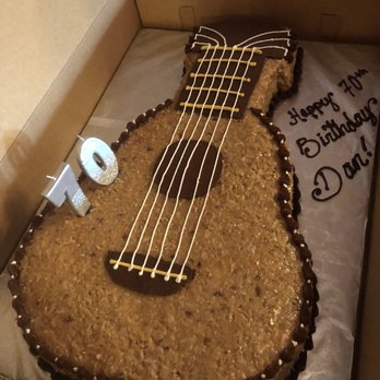 Blancas Cakes & Catering - Guitar German chocolate with German frosting (except middle was yucky white icing!). - Cupcakes Near Me - San Antonio, Texas Blancas Cakes & Catering - Guitar German chocolate with German frosting (except middle was yucky white icing!). - Cupcakes Near Me - San Antonio, Texas