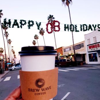 Brew Wave Coffee - a hand holding a cup of coffee - Coffee & Tea Near Me - San Diego, California Brew Wave Coffee - a hand holding a cup of coffee - Coffee & Tea Near Me - San Diego, California