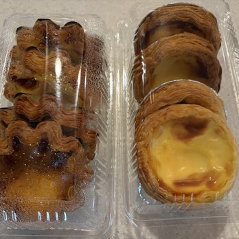Sunmerry Bakery - Left $1.49 each Napoleon egg tart, right $1 each Portuguese egg tart - Bakeries Near Me - Temple City, California
