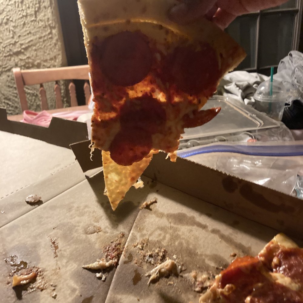 a slice of pepperoni pizza a slice of pepperoni pizza