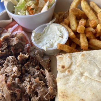 Greek Belly - Pork gyro with tzatziki sauce, slaw and oregano fries - Mediterranean Near Me - Springfield, Missouri Greek Belly - Pork gyro with tzatziki sauce, slaw and oregano fries - Mediterranean Near Me - Springfield, Missouri