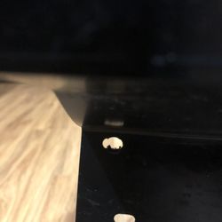 Dishwasher floor panel got ripped off and can't be put back on since hole is too big for screw to attach