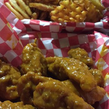Heavenly Buffaloes - The Peri Peri wet wings with blue cheese dressing and Idaho fries - Chicken Wings Near Me - Durham, North Carolina Heavenly Buffaloes - The Peri Peri wet wings with blue cheese dressing and Idaho fries - Chicken Wings Near Me - Durham, North Carolina