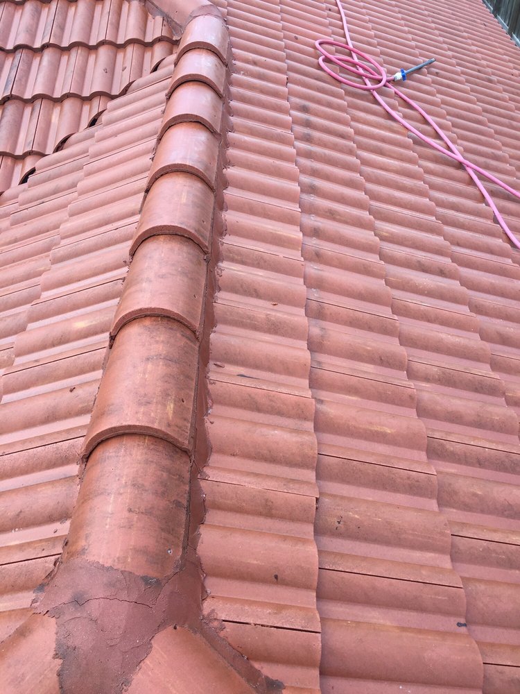 Slide of Miami Roof Cleaning Services