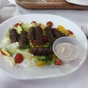 Bosna Restaurant - Cevapi with garden salad - Modern European Near Me - Richmond, Virginia Bosna Restaurant - Cevapi with garden salad - Modern European Near Me - Richmond, Virginia