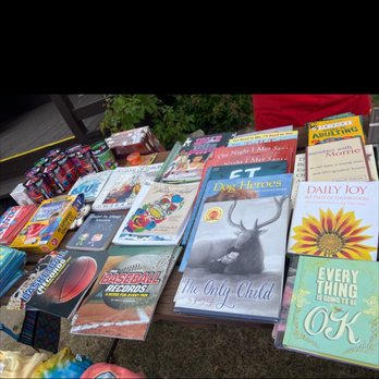 Dorset Books & Candy Shack - a table full of books and candy - Candy Stores Near Me - Kennedy, Minnesota