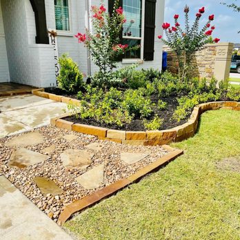 Creative Landscaping N Irrigation - a flower bed in front of a house - Landscaping Near Me Creative Landscaping N Irrigation - a flower bed in front of a house - Landscaping Near Me