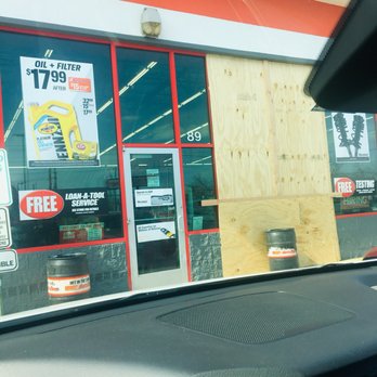Autozone - Store front of autozone all boarded up when a car drove through it. Probably wanted to run that sales guy - Auto Parts & Supplies Near Me - Hackensack, New Jersey